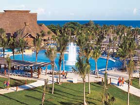 Pool and fountains of Barcelo Maya Beach all inclusive family friendly resort