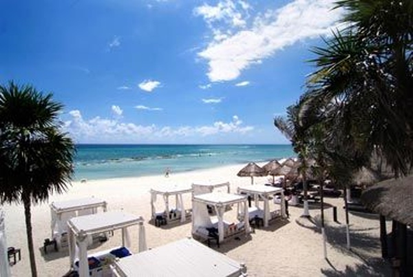 Gorgeous Beach awaits your family at the Sandos Caracol Eco Resort & spa